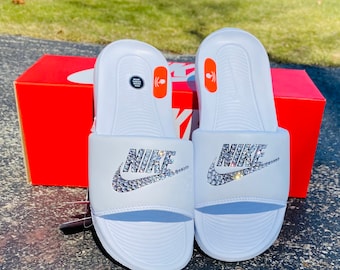 red gold nike slides