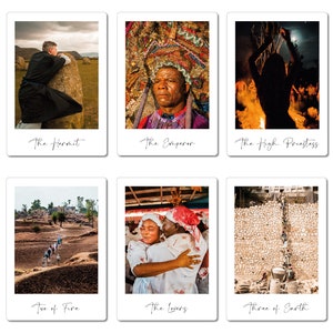 May include: A set of tarot cards with images of people and scenes. The cards are arranged in a grid of three rows and two columns. The cards are labeled with the names of the tarot cards, such as "The Hermit", "The Emperor", "The High Priestess", "Two of Fire", "The Lovers", and "Three of Earth".