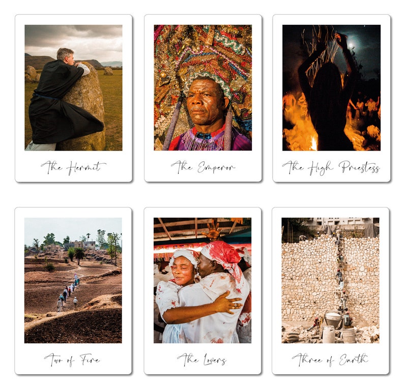 May include: A set of tarot cards with images of people and scenes. The cards are arranged in a grid of three rows and two columns. The cards are labeled with the names of the tarot cards, such as "The Hermit", "The Emperor", "The High Priestess", "Two of Fire", "The Lovers", and "Three of Earth".