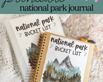 May include: Two brown journals with gold spiral bindings. The covers feature the text "National Park Bucket List" and a watercolor illustration of mountains and trees.