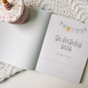 The Birthday Book title page features a colorful banner with the title The Birthday Book underneath. Beneath that is the text celebrating with a line under it.