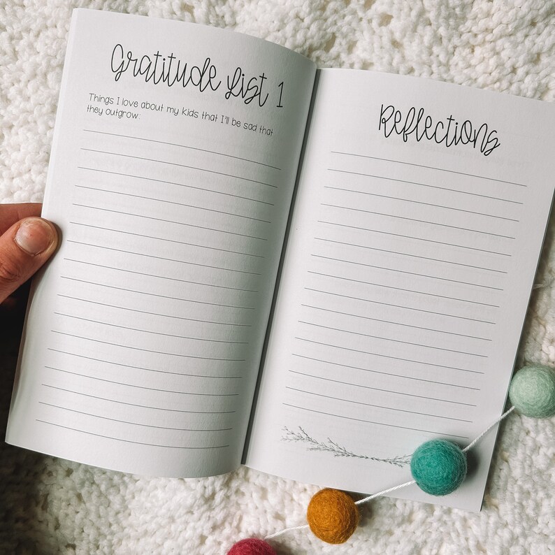 Gratitude list one is Things I love about my kids that I'll be sad that they outgrow with a full lined page. Opposite page is titled reflections with a full lined page.