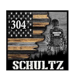 May include: A black and white image of an American flag with a distressed wood grain texture. The flag is torn and faded, with the number "304" printed on the top left corner. A silhouette of a person wearing a uniform with the text "CORRECTIONS OFFICER" is standing in front of the flag. The text "SCHULTZ" is printed below the flag.