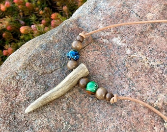 Antler pendant with wood and glass beads on adjustable rawhide cord