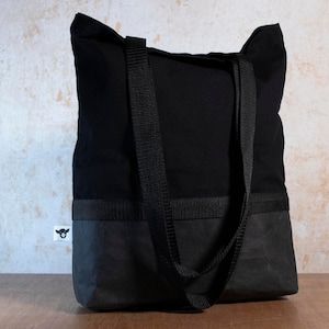 schlichte und besondere Einkaufstasche aus schwarzem Baumwoll-Canvas und schwarzem Waschpapier mit schwarzem Gurtband für Männer und Frauen