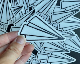 Avión de papel blanco, calcomanía de vinilo impermeable, computadora portátil, patineta, regalo para calcetines, botella de agua, auto de choque, arte de avión, avión de papel