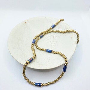 Boho chic Gold and blue beaded necklace. Perfect for day or night , dressy or casual