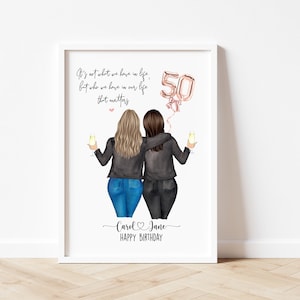 May include: A white framed print with a quote about friendship and a drawing of two women in black jackets and jeans, holding glasses of champagne. The quote reads "It's not what we have in life, but who we have in our life that matters." There is a pink and gold balloon that says "50" and the names "Carol & Jane" with the text "Happy Birthday" below.