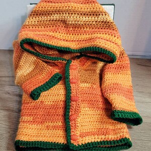 Pumpkin sweater.   With hood and pumpkin buttons