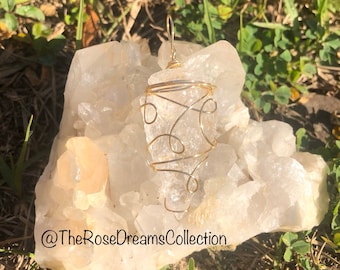 Clear quartz arrowhead pendant