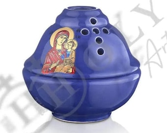 May include: Blue ceramic incense burner with a depiction of the Virgin Mary and baby Jesus. The burner has a lid with holes for incense to escape.
