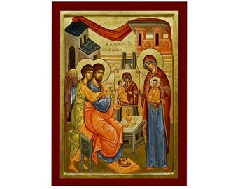 May include: A religious icon depicting the Holy Family. The icon features a gold background with a red frame. The figures of Mary, Joseph, and the baby Jesus are painted in a traditional Byzantine style. The icon includes the text "ΕΥΑΓΓΕΛΙΣΜΟΣ ΤΗΣ ΘΕΟΤΟΚΟΥ" in Greek.
