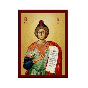 May include: An icon of a religious figure with a red hat and a scroll in their hand. The scroll has text in a foreign language. The background is a gold color with a red border.