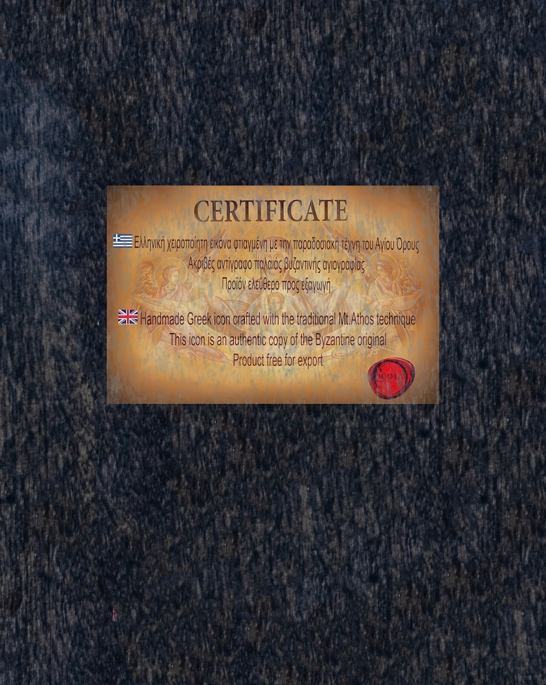 Puede incluir: Certificado para un icono griego hecho a mano, elaborado con la t&eacute;cnica tradicional del Monte Athos. El certificado indica que el icono es una copia aut&eacute;ntica del original bizantino y es un producto libre de exportaci&oacute;n. El certificado presenta un sello de cera roja con la palabra "HOLY" impresa en &eacute;l.