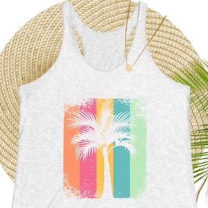 A white heathered tank top with a distressed, retro-style palm tree graphic on stripes of shades of pink, orange, yellow, green, and blue.