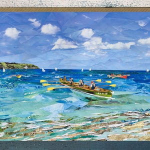 May include: A collage art print showing a coastal scene with a rowing boat in the turquoise water. The sky is blue with white clouds, and small sailboats dot the horizon. The artwork has a textured, layered appearance.
