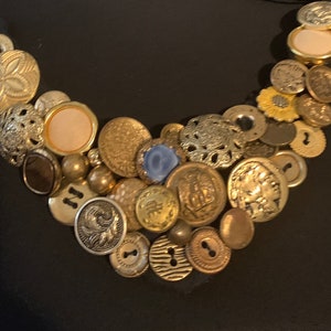 bib necklace with vintage and unique buttons a one of a kind handmade necklace