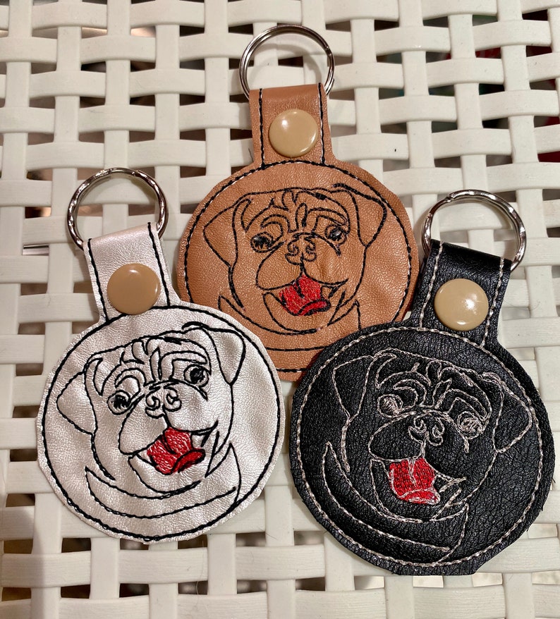 ITH Pug key fob machine embroidery design. Pug face embroidery. Key chain, snap tab in the hoop embroidery design. For the hoop 4x4 image 1