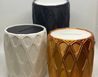 Tirelire en soie et cuivre pour la monnaie et les billets