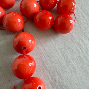 Orange agate Round beads , bulk listing 1 strand of 23 beads