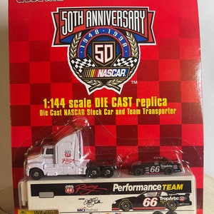 Collectible NASCAR 50th Anniversary Phillips 66 Scale model racing team car and tractor trailer