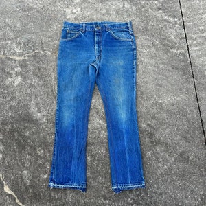 Vintage Lee 80er 90er Jahre 33x29 (nicht gesäumt) 100 % Baumwolle Denim Jeans. Hergestellt in den USA. Papieranhänger. Unglaublich weich. Union Made. Dunkle Waschung