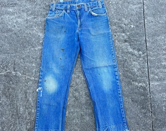 Vintage mid rise Twister denim jeans. 30x27. Faded stained and distressed. Hem will need to be sewn. Inseam was redone. Great wear