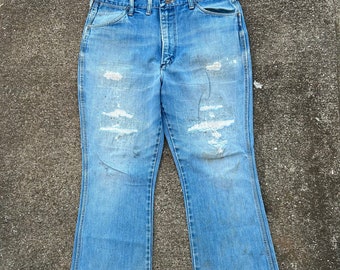 Vintage Wrangler 80s 90s 34x27(Tag 38x30) 100% cotton denim jeans. Made in the USA. Paper tag. Incredibly soft. Union Made. Lots of patches