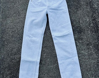 Vintage 80s Levi’s white 501 button fly 26x29(tag 28x30) 100% cotton denim jeans Made in the USA 10/1989.Some light stains.No tears No holes