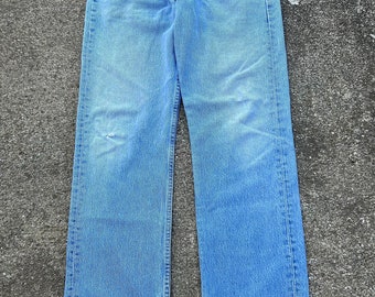 Vintage Levi’s 501 32x29(tag 34x30) button fly 100% cotton denim jeans. Made in the UK 01/1993. Light wash and faded. Incredibly soft.