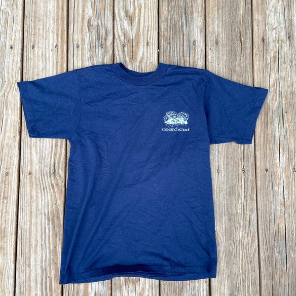 Vintage extra small/small Best Fruit of the Loom 50/50 blend navy blue T-shirt. Made in the USA. Single Stitch. Oakland School on left chest