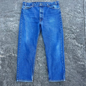 Vintage Levi's 505 39x28.5(etiqueta 42x30) pestaña naranja, jeans denim 100% algodón. Fabricado en EE.UU. Noviembre de 1993. Hermosa marca de desvanecimiento en la billetera.