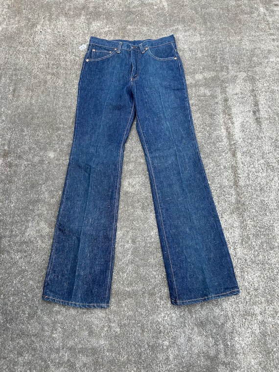 Vintage 70s 80s with flare at the ankle Levi’s red