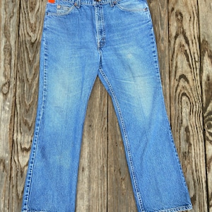 Vintage 517 Orange Tab 37x30 Levis Jeans. Hergestellt in den USA. 100 prozent Baumwolle. Schöne Brieftasche Fade Linien auf der linken Gesäßtasche.