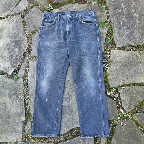 Vintage Wrangler 32.5x28(tag 36x30) faded black 100% cotton denim jeans. Made in the USA. Gorgeous wallet fade mark back left pocket.