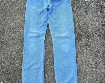 Vintage 90s Levi’s button fly 501 28x31(tag 30x32) 100% cotton denim jeans. Made in Brussels Belgium Light wash and faded. Incredibly soft.