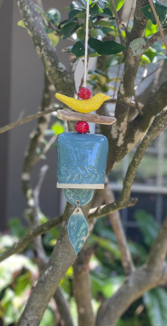 Whimsical Ceramic Wind Bell with Yellow Bird & Driftwood – Handmade Garden Chime