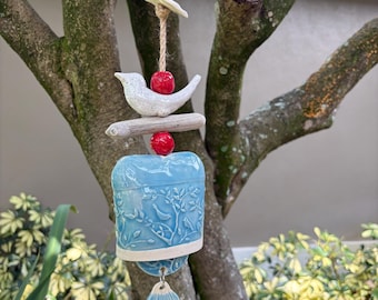 Whimsical Ceramic Wind Bell with White Bird, Leaf, and Driftwood Accent