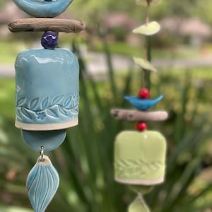 Whimsical Ceramic Wind Bell with Blue Bird, Leaf, and Driftwood Accent