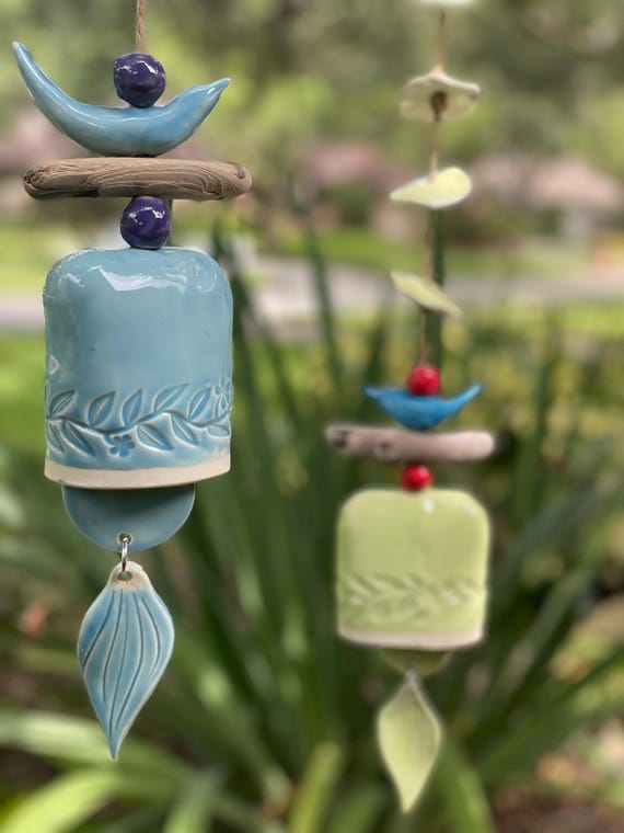 Whimsical Ceramic Wind Bell with Blue Bird, Leaf, and Driftwood Accent