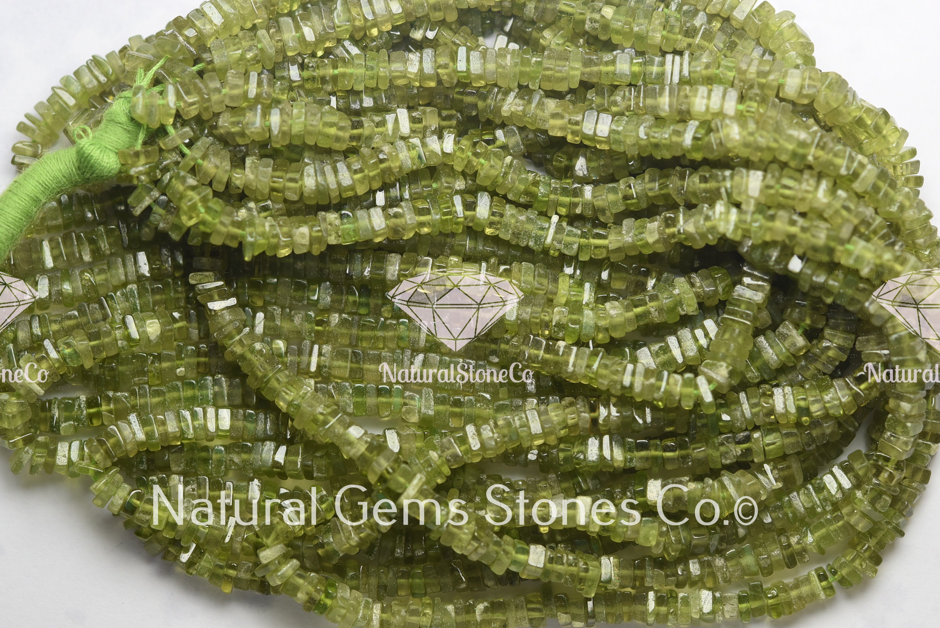 4-4.5mm AAA Natural Green Peridot Faceted Rondelle Wheel Gemstone Beads 4-4.5mm AAA Natural Green Peridot Faceted Rondelle Wheel Gemstone Beads