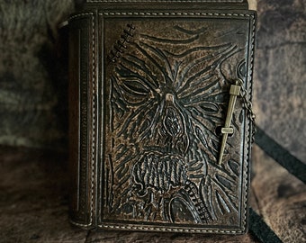 clearance sale for used Necronomicon male bag (coin pocket, cardholders, internal cell phone pocket)(only one in stock)