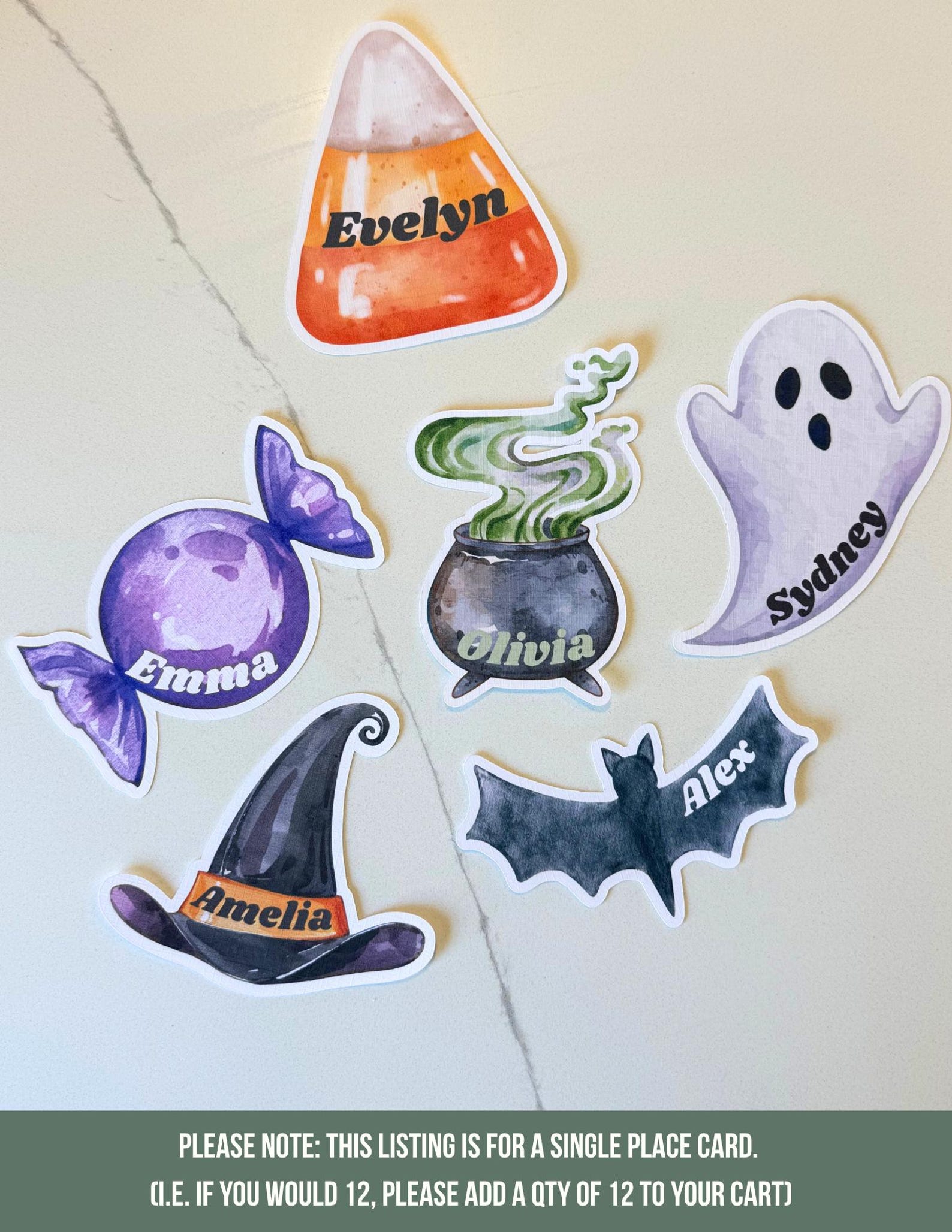 Watercolor Treat Shapes as Name Markers Watercolor Halloween place-card cutouts including candy, ghost, bat and cauldron shapes.