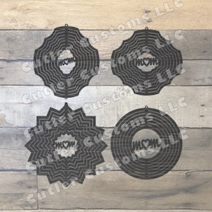 May include: Four black metal wind spinners with a layered design. Each spinner features the word "MOM" with a heart in the centre.