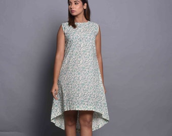 Printed sleeveless asymmetrical high-low hem, two side pockets, and a shell button closure back, ready to Ship, Sale