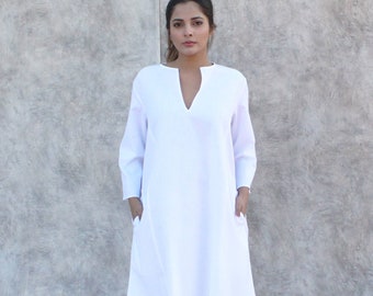 white linen flowing dress