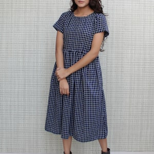 easy to wear short sleeves black checkered linen smock tea dress in midi length includes pockets