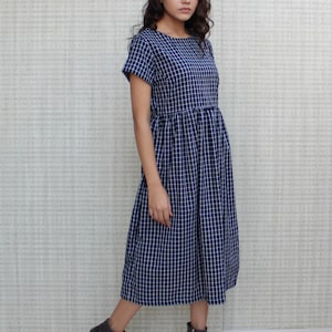 short sleeves black checkered linen smock tea dress in midi length includes pockets