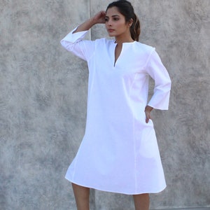 Simple, comfortable linen cotton washed  Loungewear White  split neck full sleeves A- line dress with pockets