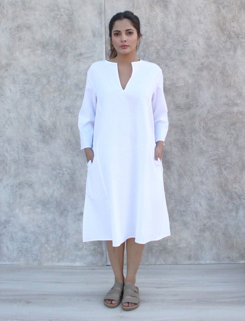 women office wear White  split neck full sleeves A- line dress with pockets